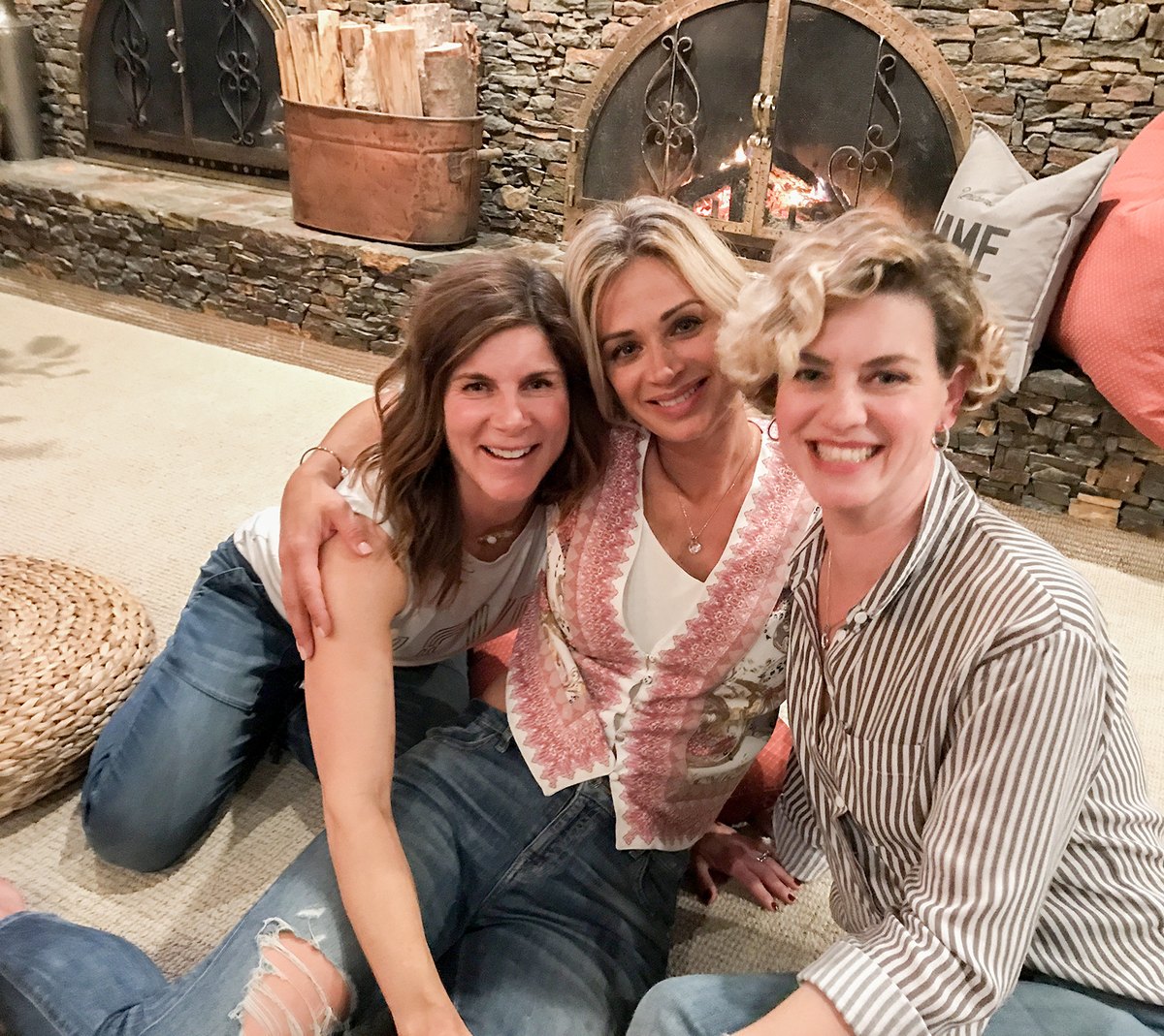 Three friends by the fireplace